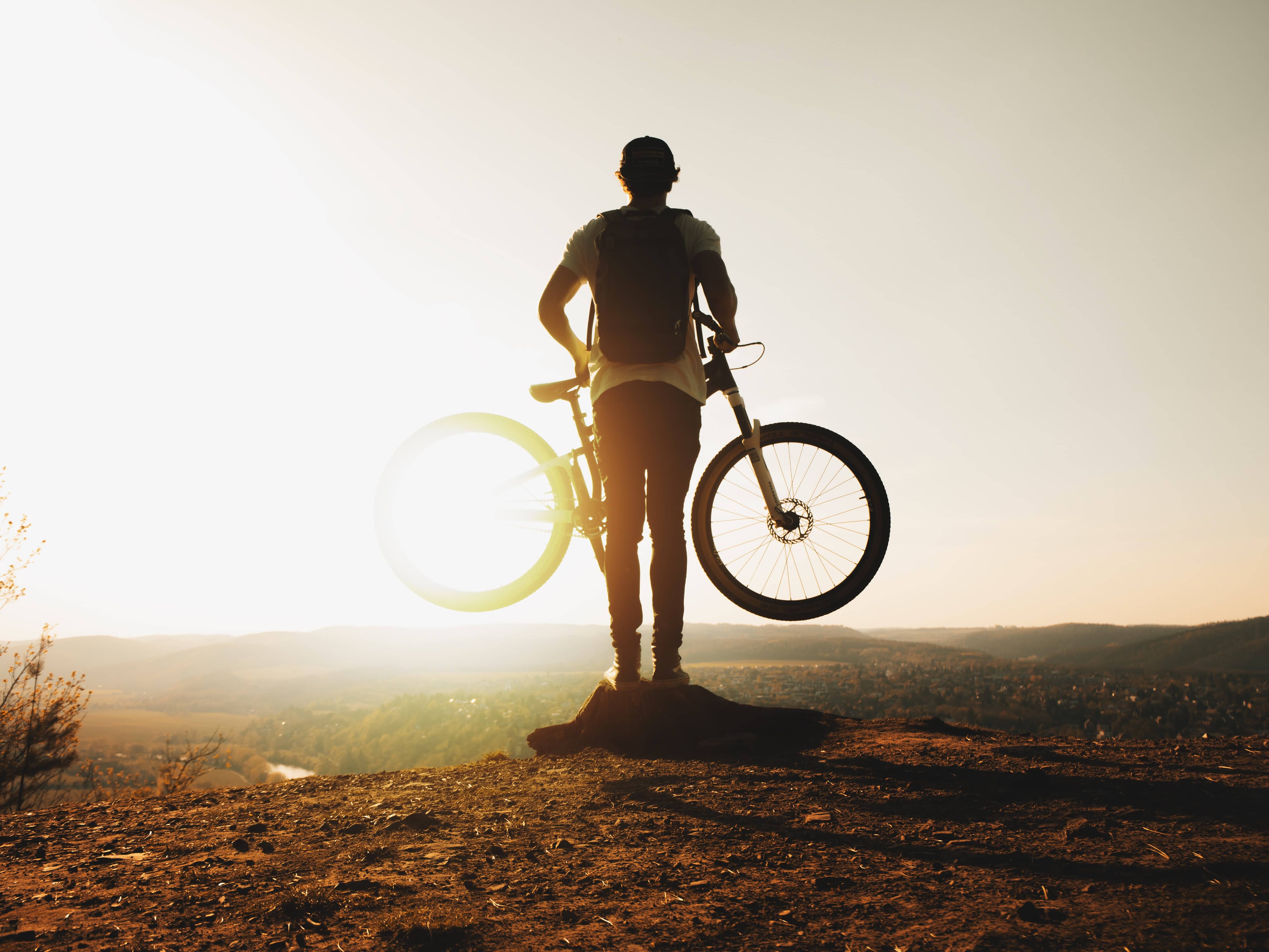 Mountain Biker looking at Sunset