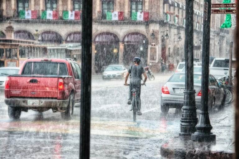 Biker riding in the rain