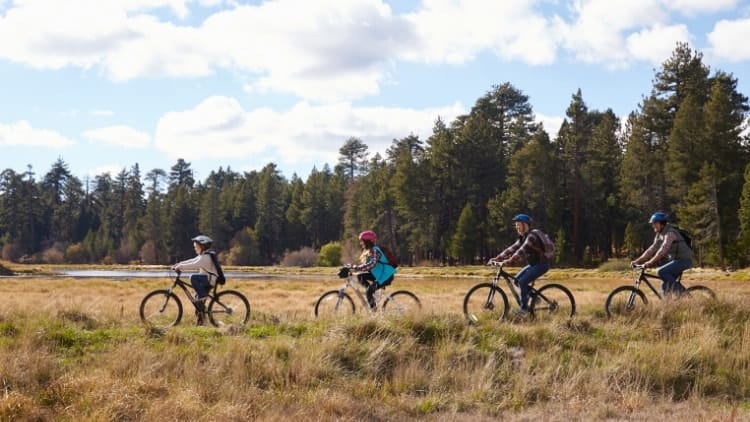 kids mountain biking near field