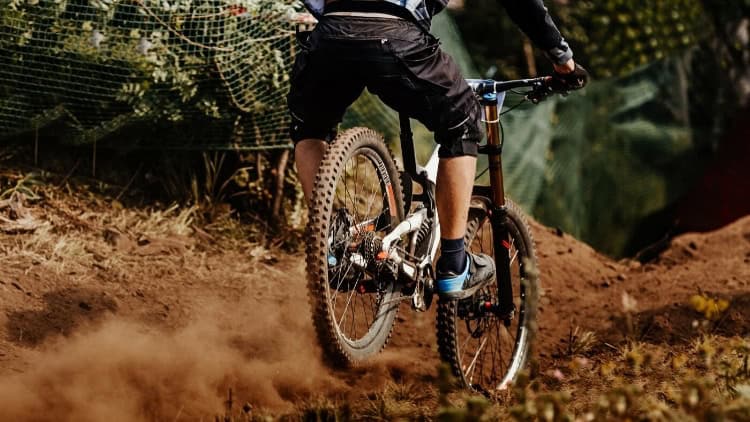 mountain biker riding hard