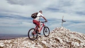 mountain biker riding up hill