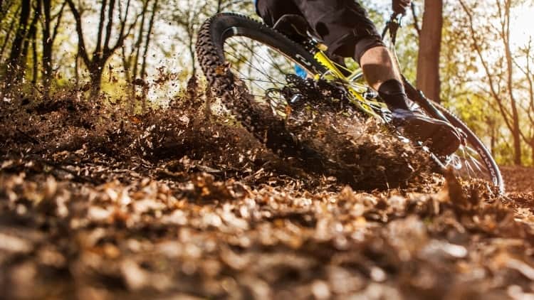 rider going fast on an advanced mtb trail