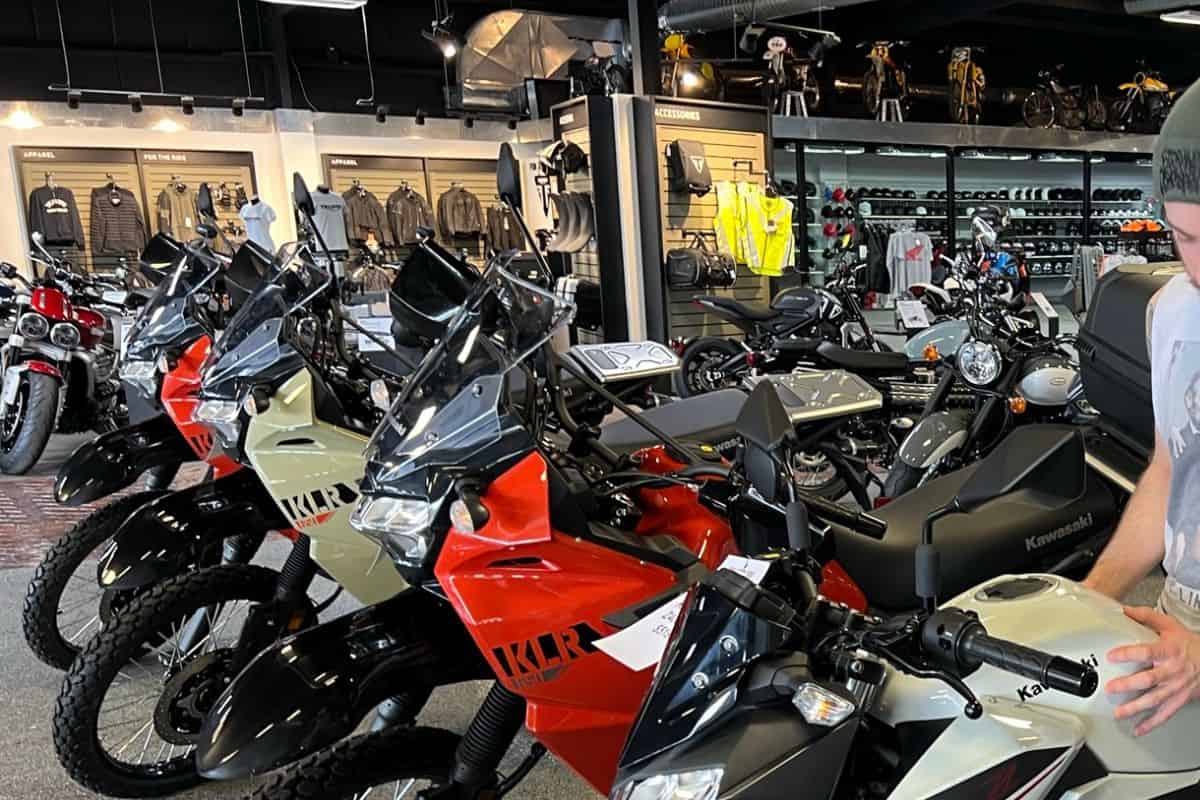 inside of dealership with motorcycles lined up