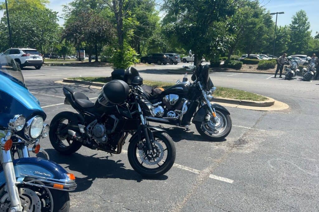 two different types of motorcycles parked side by side