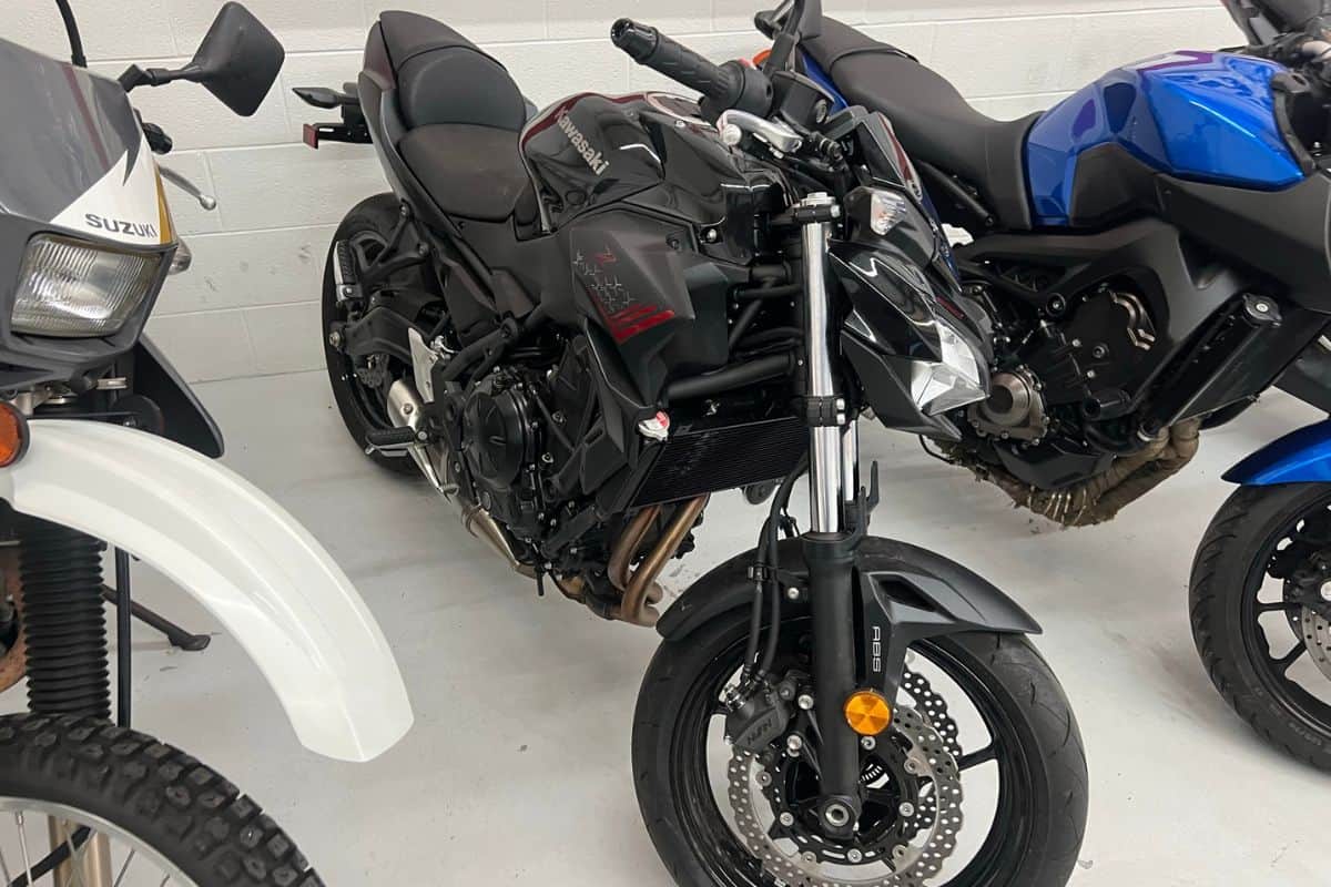 picture of used z650 inside of a used motorcycle dealership