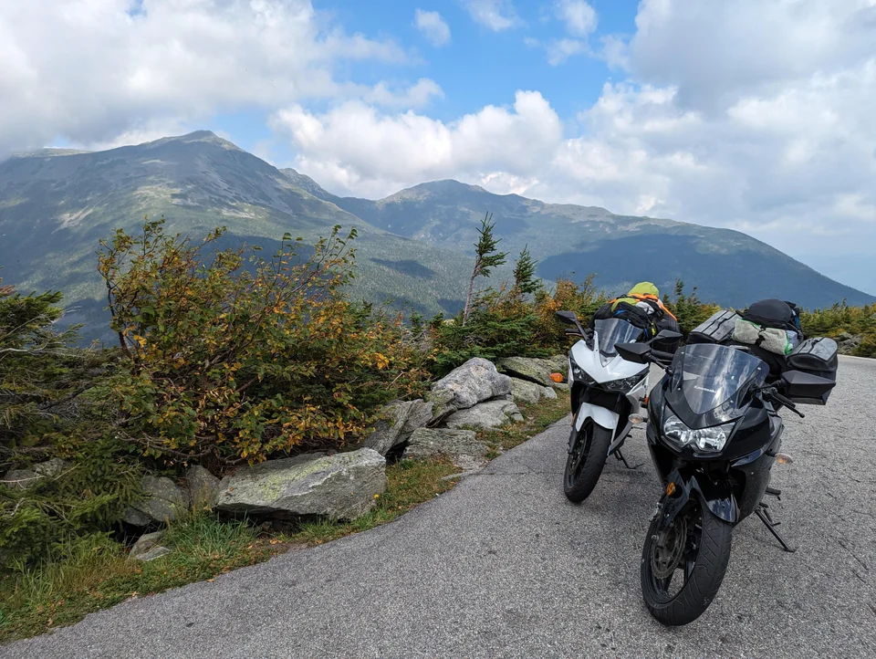 two 250cc motorcycles loaded for touring