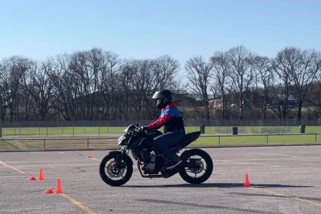 rider stopping within cones on motorcycle course