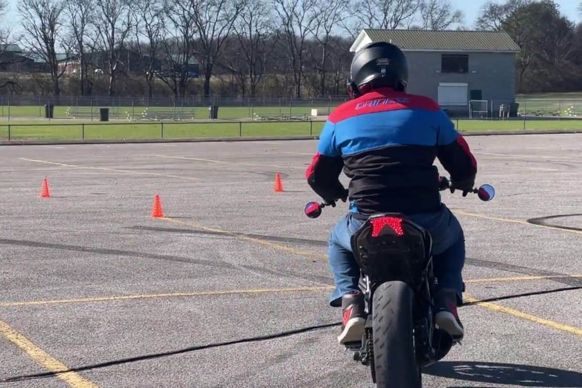 rear view of rider on msf course with view of motorcycle jacket and helmet