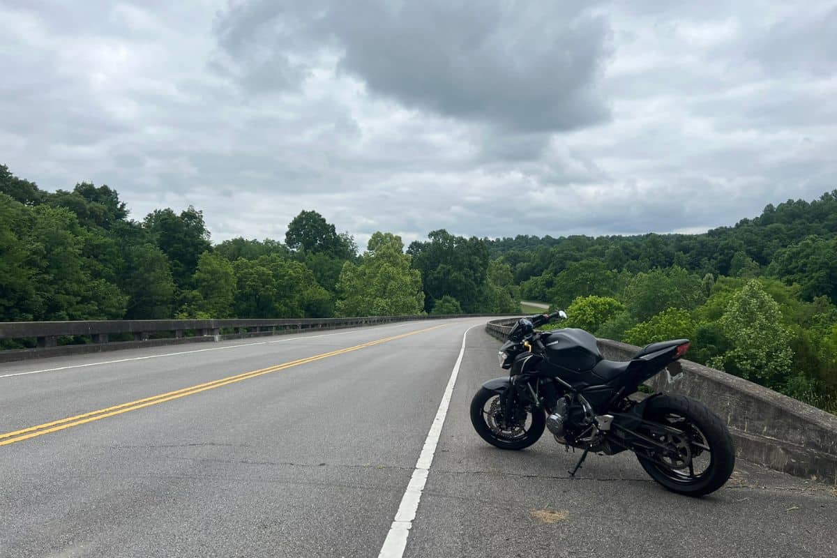 motorcycle parked by road