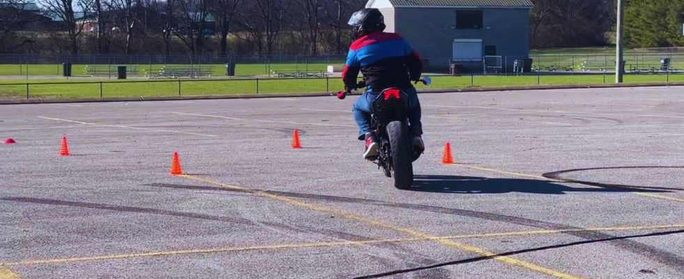 motorcyclist turning on course