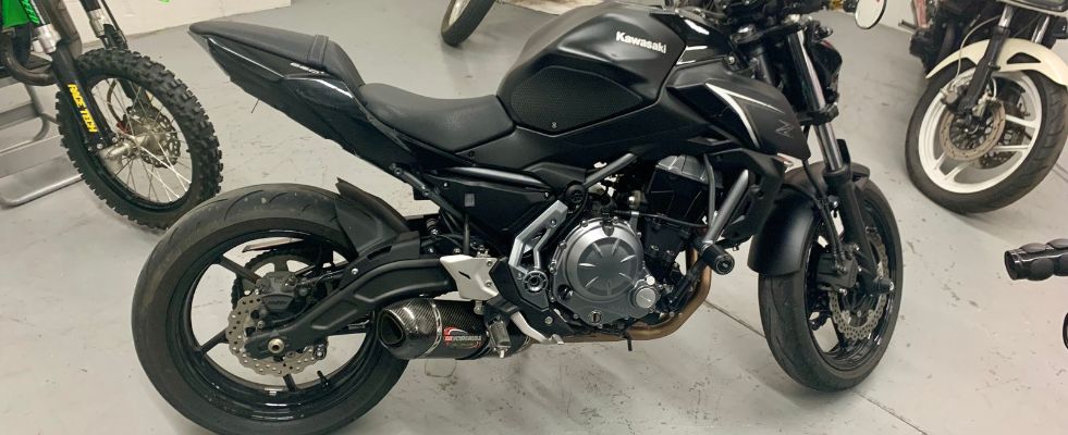 picture of sportbike with visible wear in a dealership