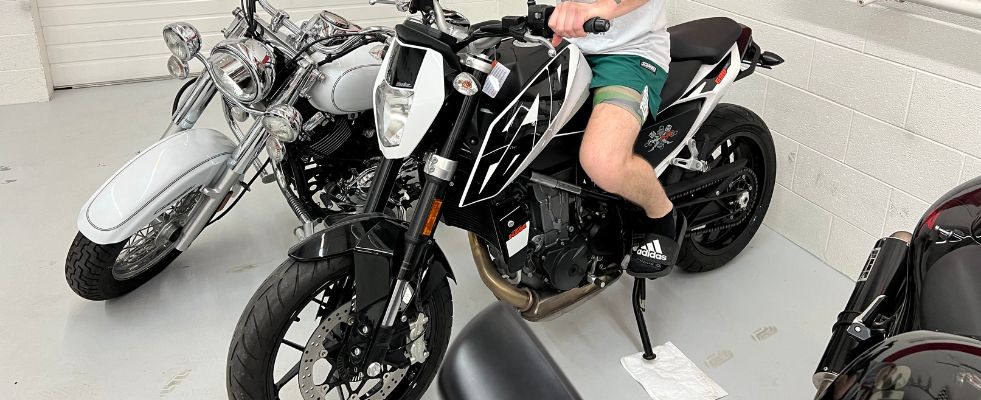 testing older motorcycle at dealership